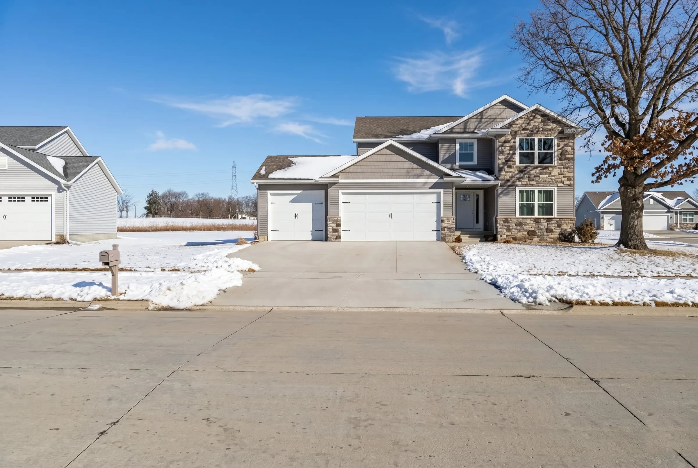 Finished driveway approach on a new Iowa home
