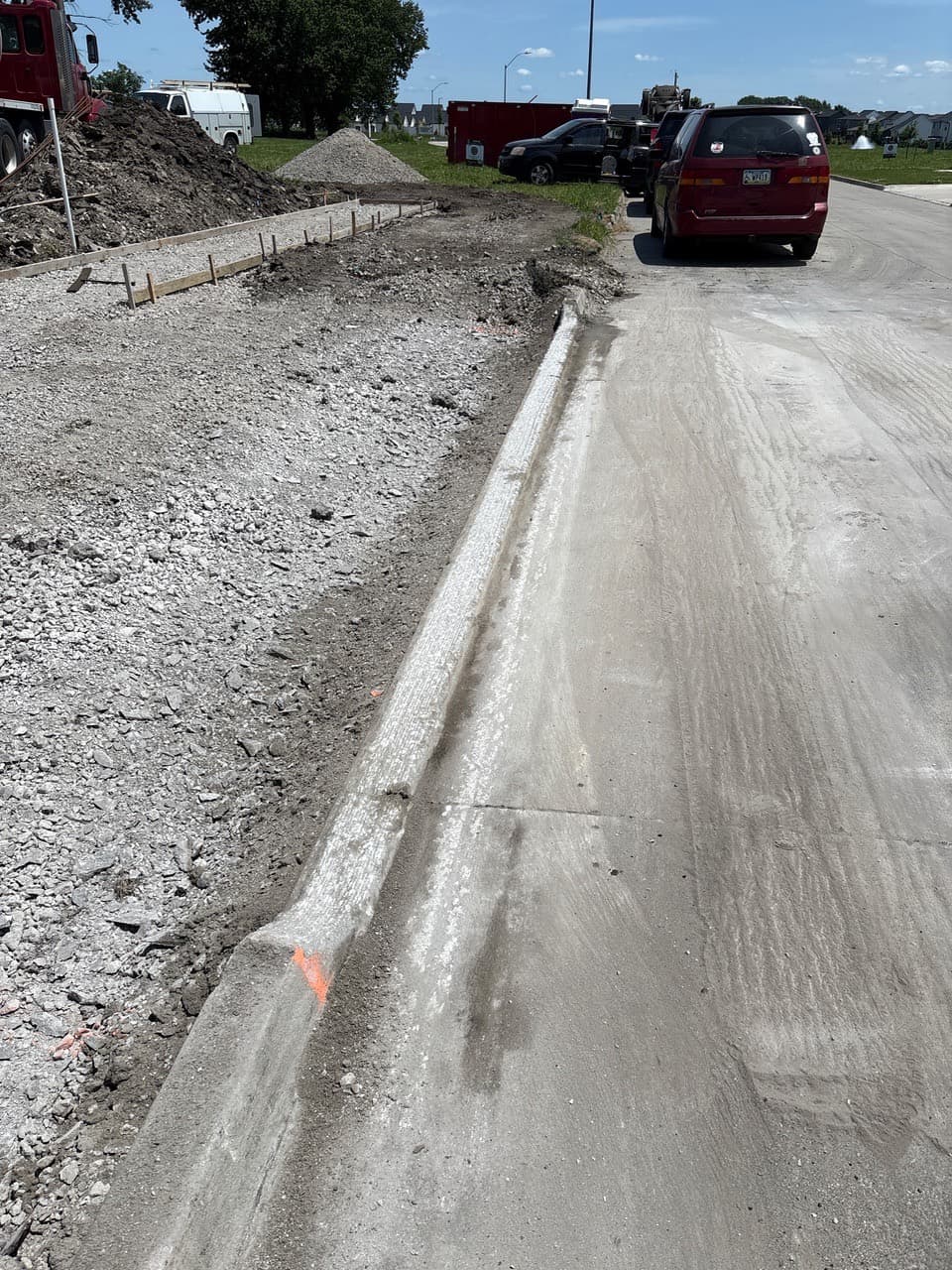Curb grinding for a driveway approach on NW Wilder Court in Waukee, Iowa